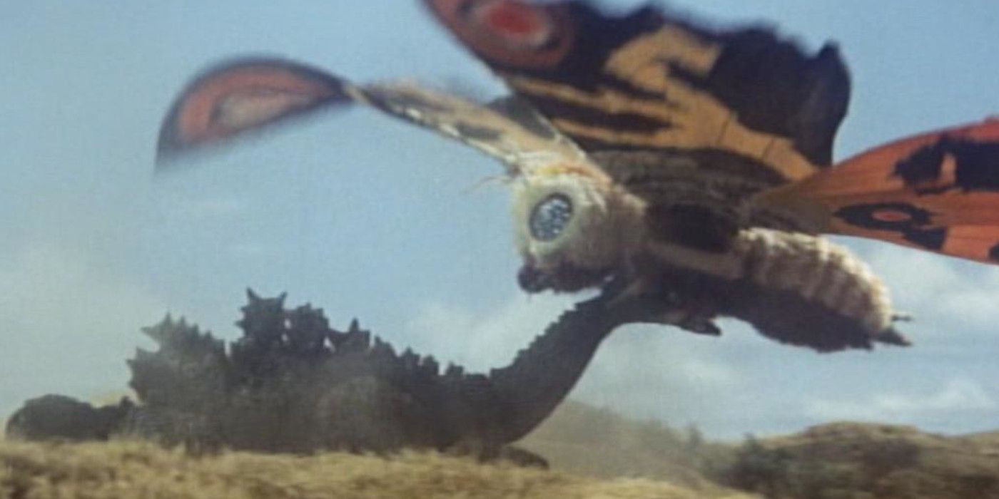 Mothra holding Godzilla by the tail in Mothra vs. Godzilla