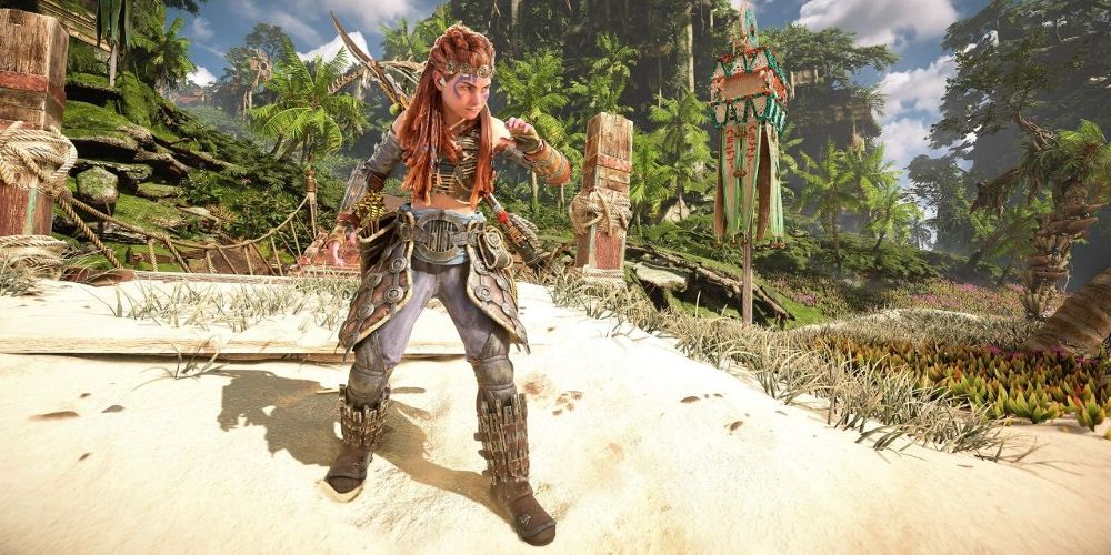 Aloy stands in the sand in Horizon Forbidden West