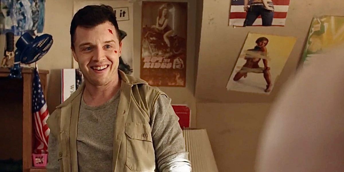 Mickey Milkovich smiling at Ian Gallagher with cuts on his face