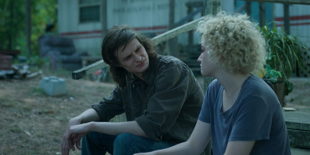 Wyatt and Ruth sit on the steps and chat in Ozark