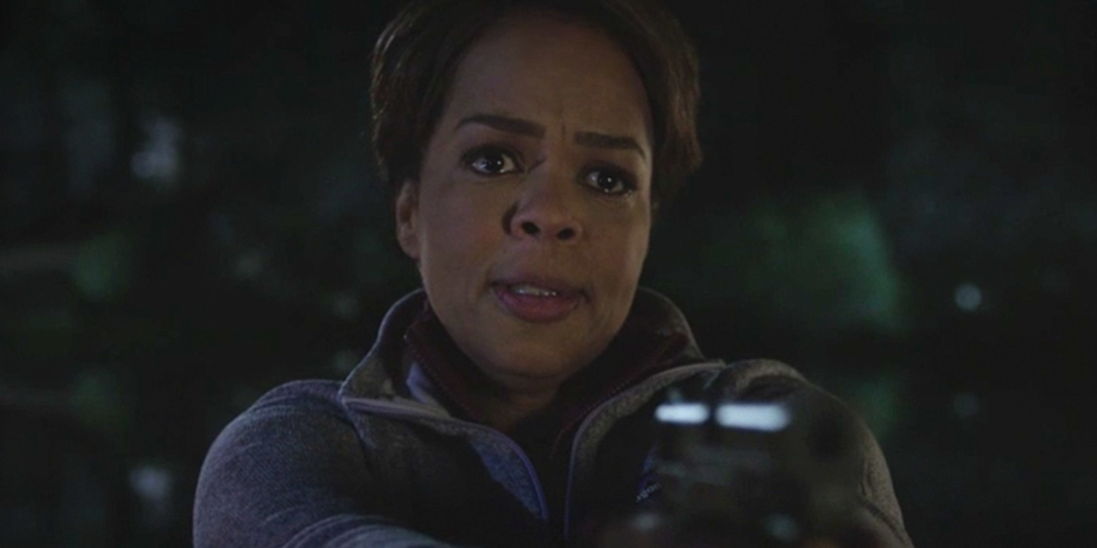 Detective Janice Moss (Paula Newsome) with her gun trained on Barry in HBO's Barry