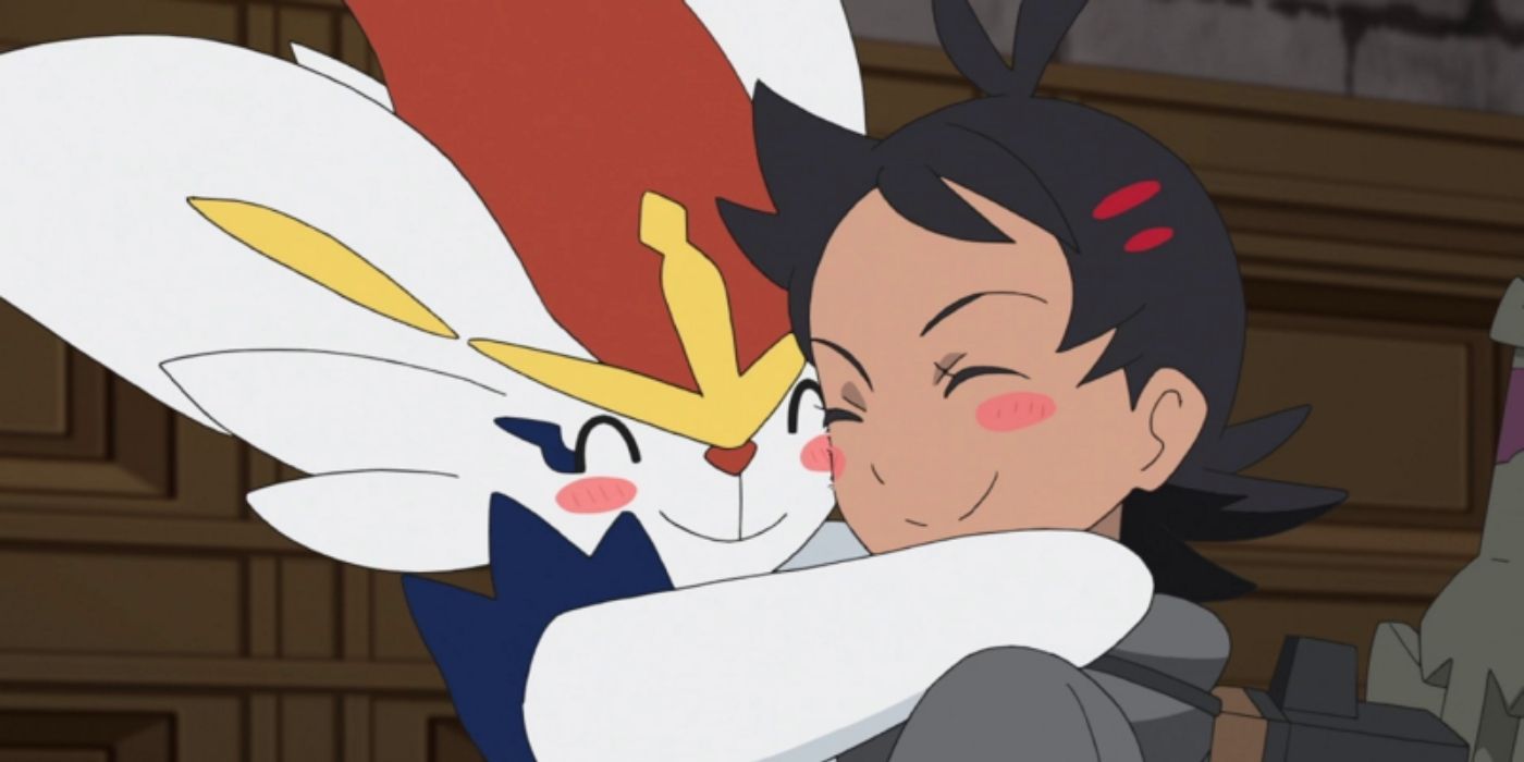 Cinderace and Goh hugging in the Pokémon anime.