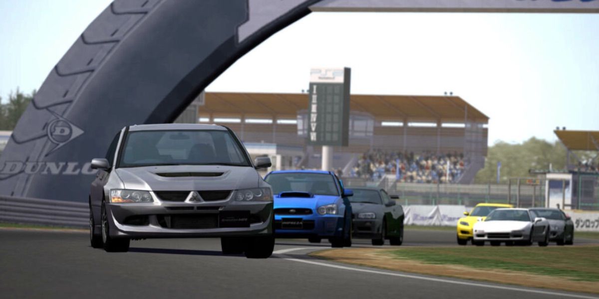 Cars make a sharp turn from Gran Turismo 4
