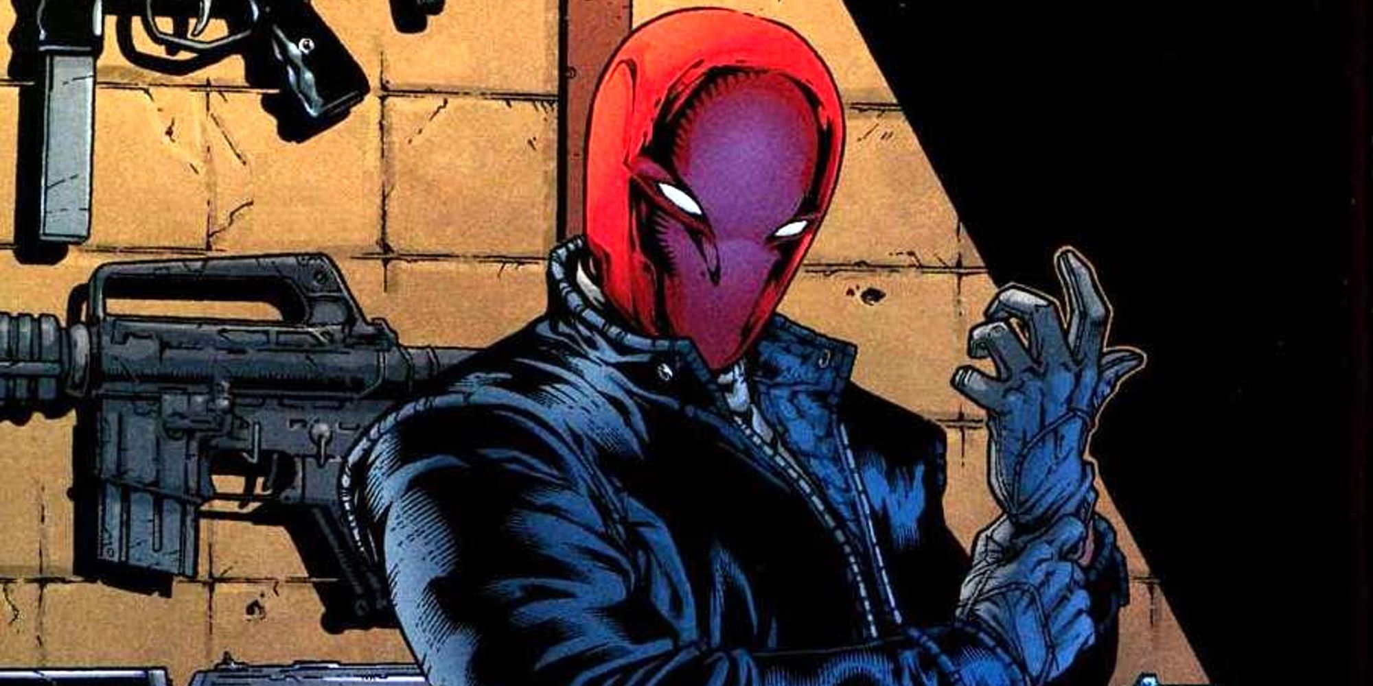 Red Hood in front of his arsenal in Batman Under The Red Hood comic