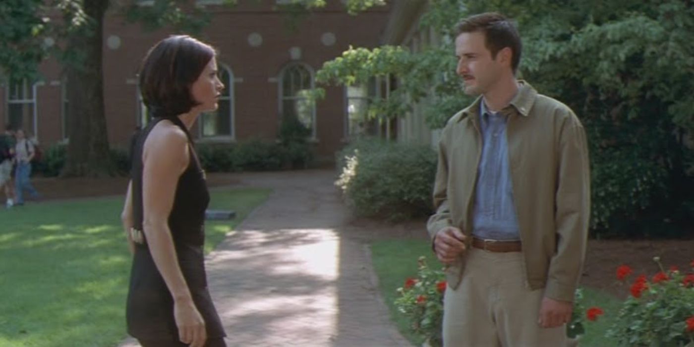 Sidney and Dewey standing outside talking in Scream 2