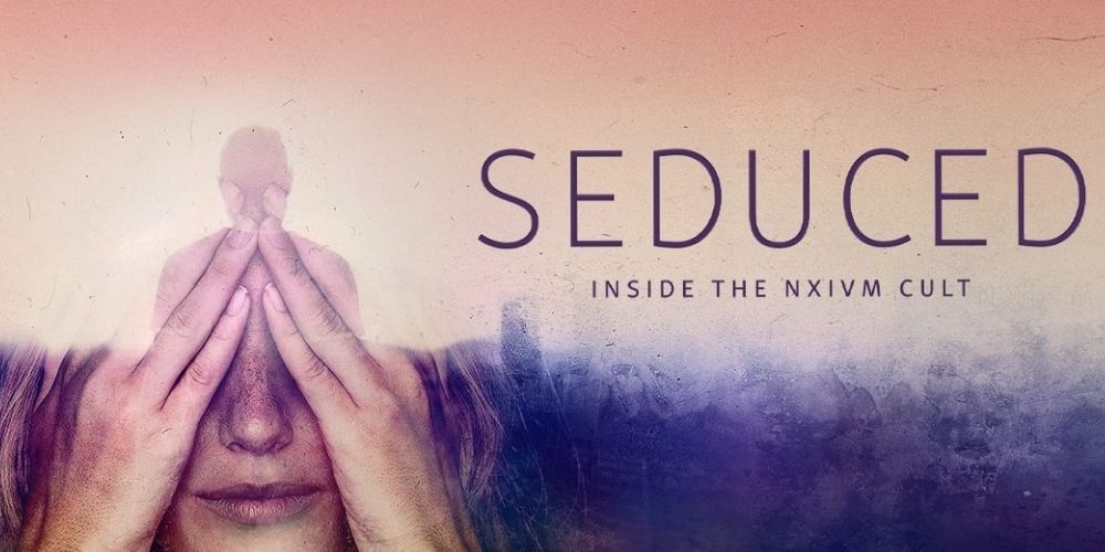 India Oxenberg covers her face on the cover of Seduced 