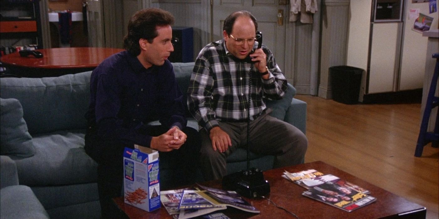 Jerry and George sitting on the couch together on Seinfeld