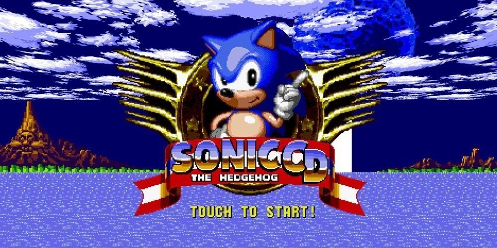 Sonic stands in his trademark winged badge on the home screen of Sonic CD
