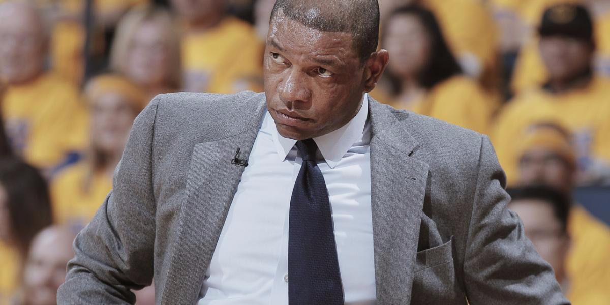 Coach Doc Rivers looks on from the sidelines from The Playbook
