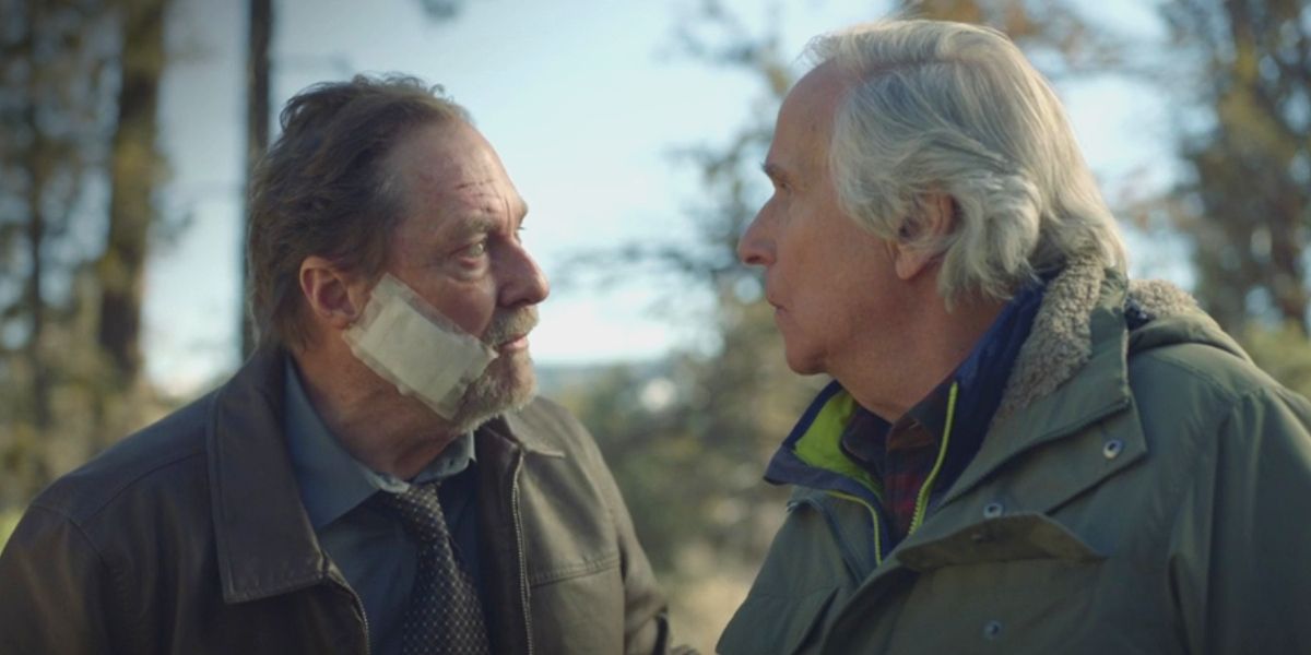 Monroe Fuches (Stephen Root) speaking to Gene Cousineau (Henry Winkler) in the woods in HBO's Barry