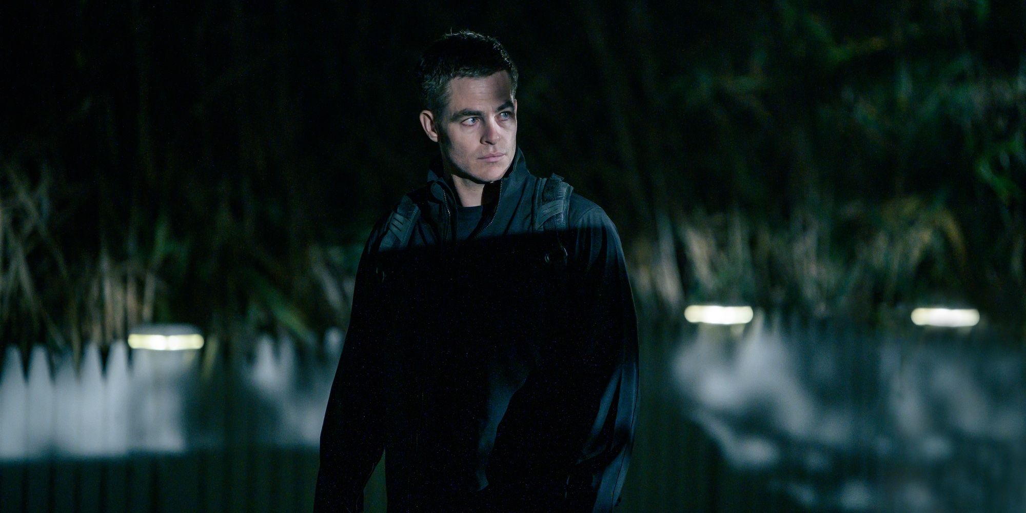 Chris Pine walking in the streets in The Contractor.