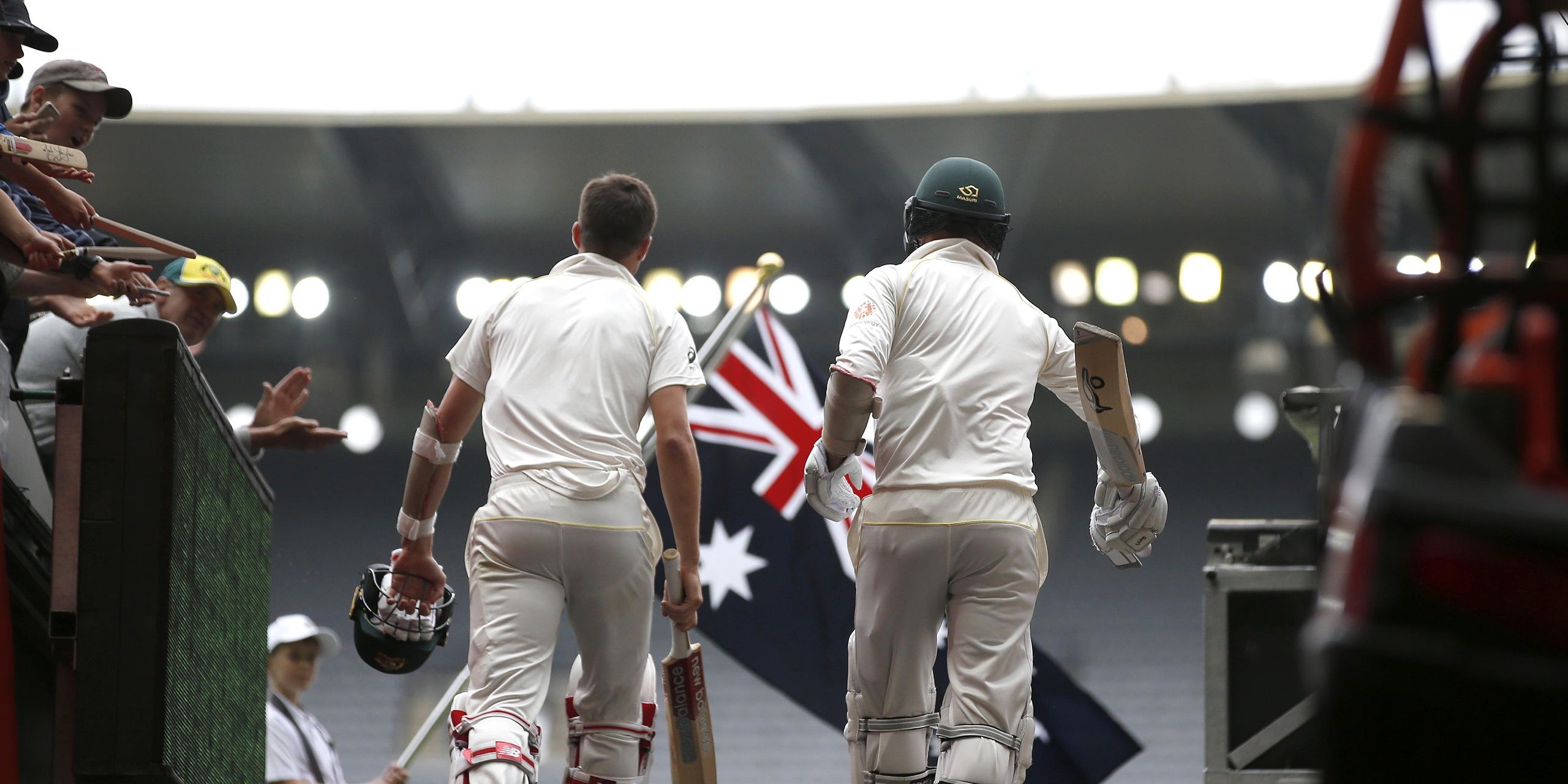 Members of Australia's cricket team walk to the field in The Test: A New Era for Australia’s Team