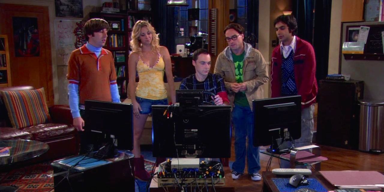 The gang watches Sheldon on a car simulator in The Big Bang Theory Cropped