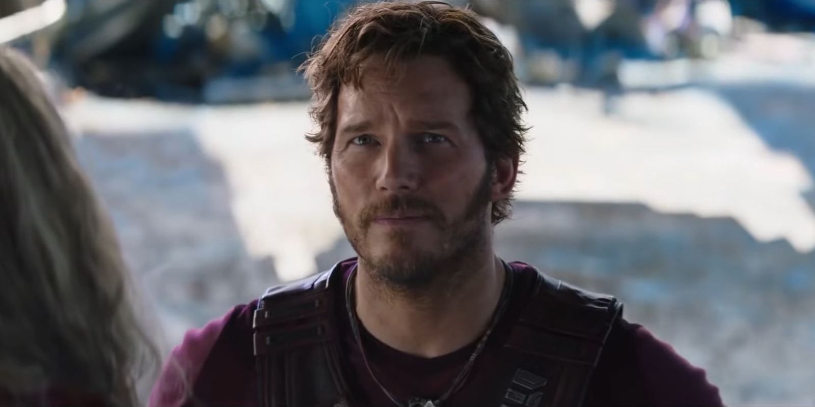 Chris Pratt as Peter Quill looking lovingly at the other Guardians of the Galaxy