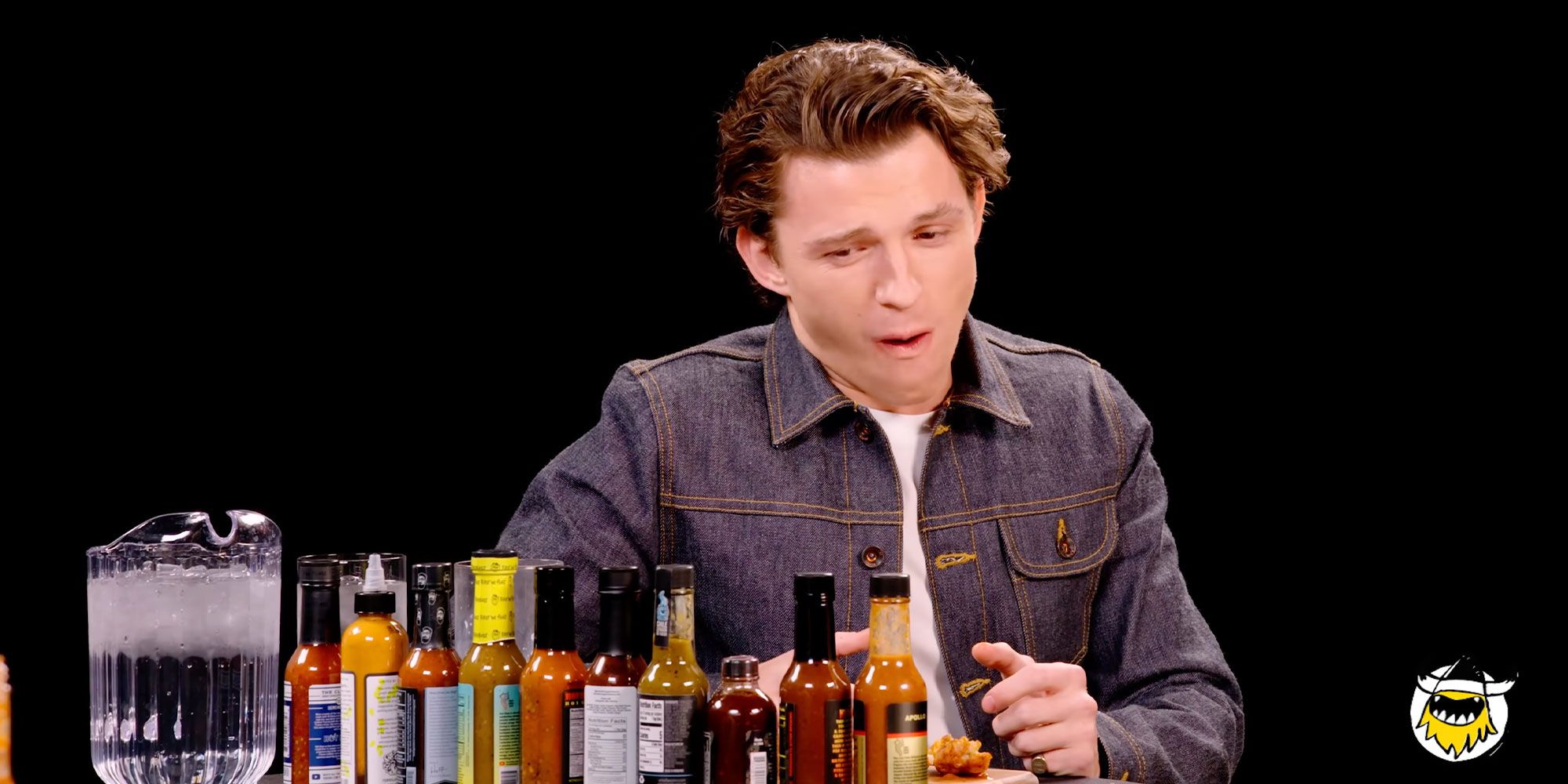 Tom Holland struggling with spice on Hot Ones