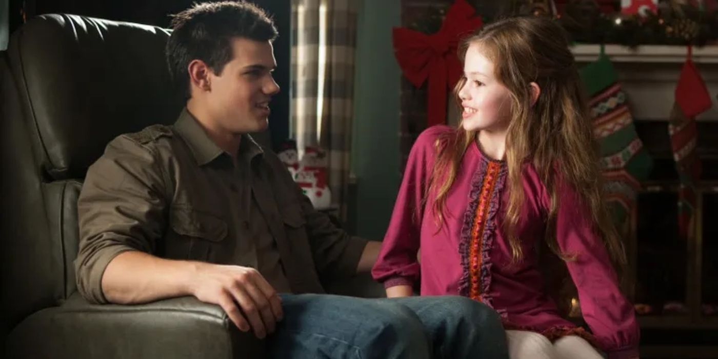 Jacob and Renesmee smiling at each other in Twilight