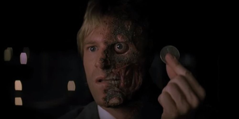 Two-Face confronts Gordon and Batman in The Dark Knight