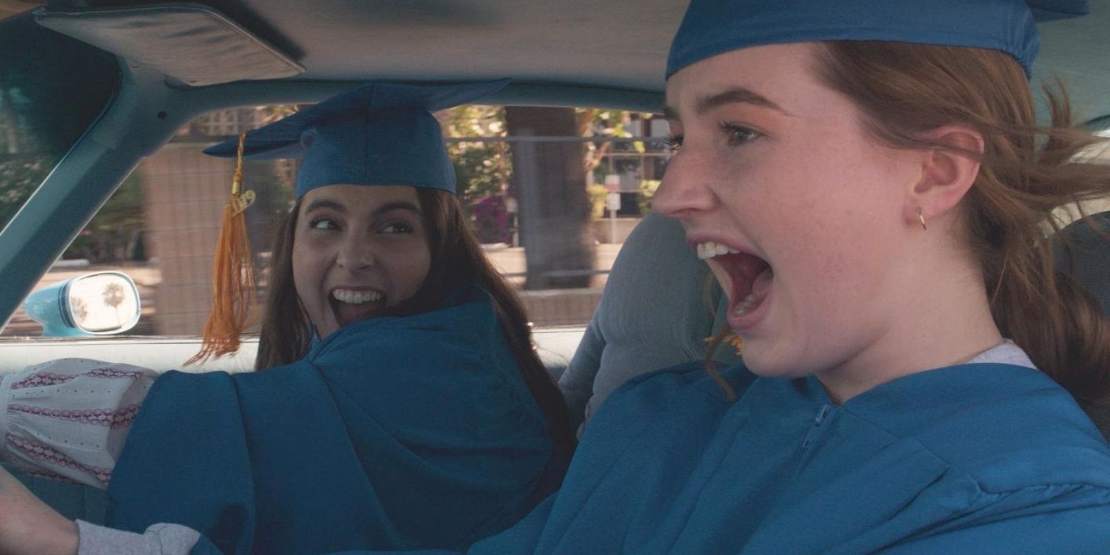 Amy and Molly in graduation gowns in Booksmart