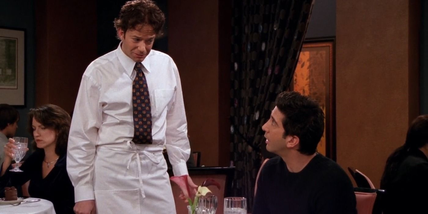 Ross talking to a restaurant waiter in Friends