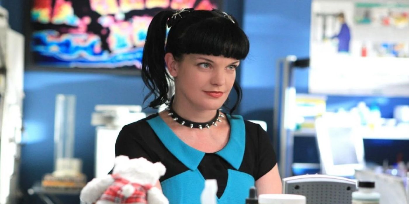 abby sciuto smiling and looking offscreen in ncis