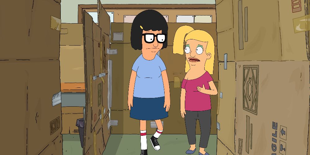 Louise and Tammy walk together by boxes in Bob's Burgers