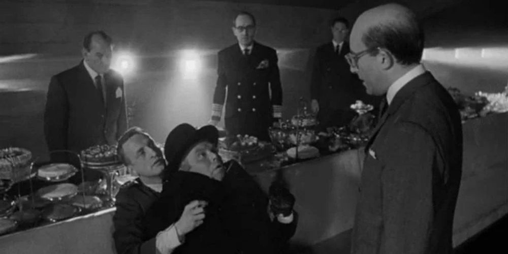 President Muffley confronts fighters in the war room in Dr. Strangelove