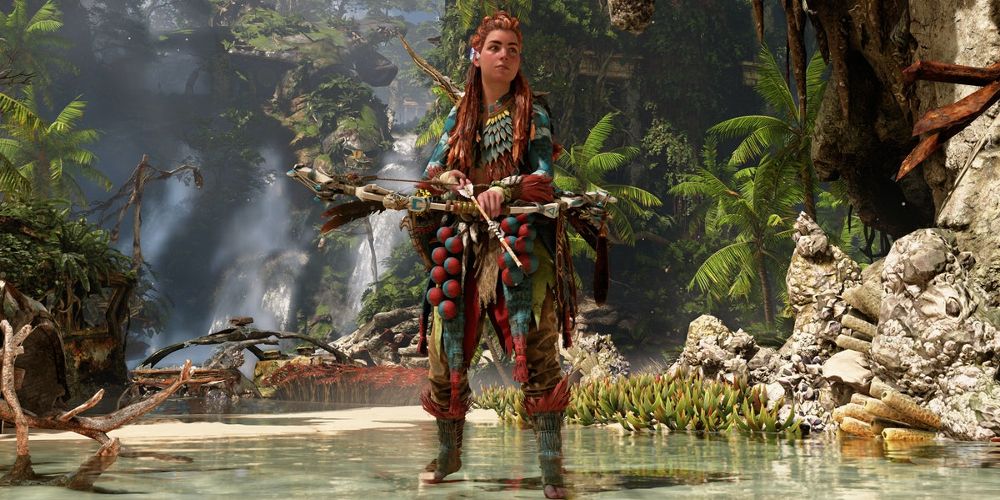 Aloy stands in a stream in Horizon Forbidden West