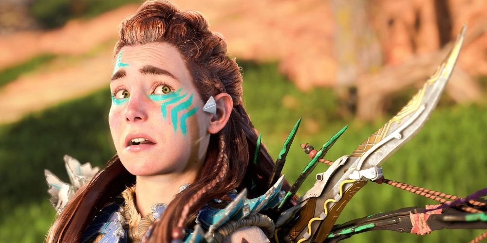 Aloy wears teal face paint in Horizon Forbidden West