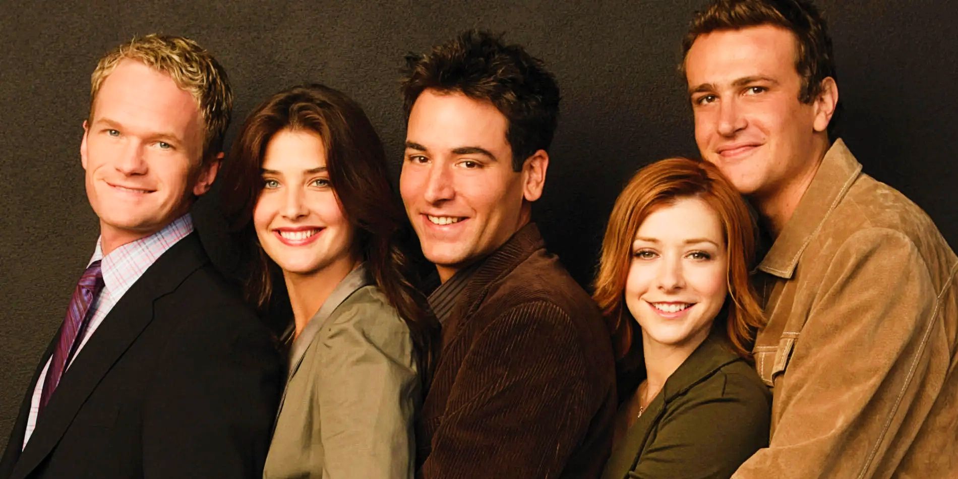 The main cast of How I Met Your Mother posing for a photo.