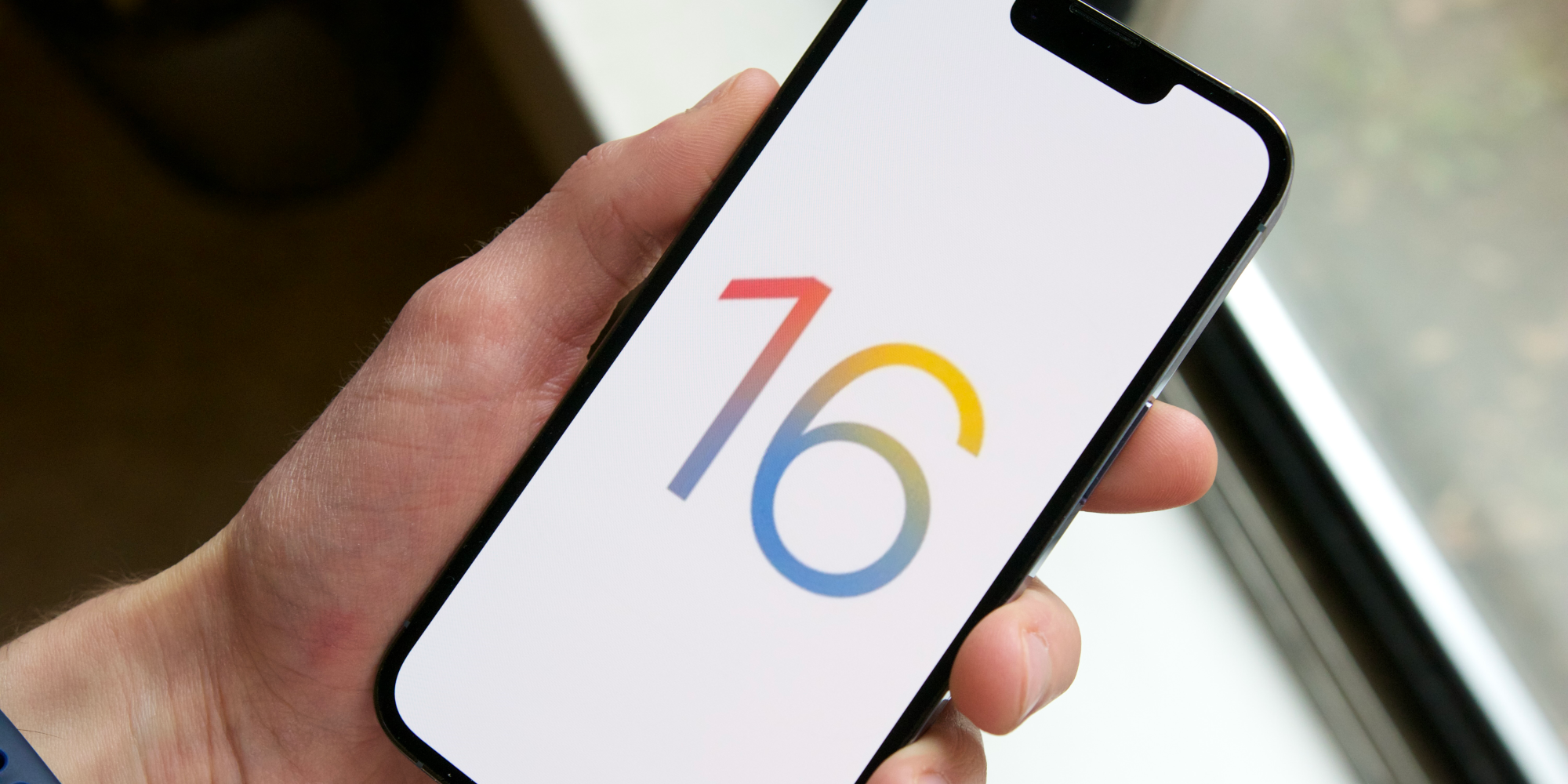 iOS 16 logo on an iPhone
