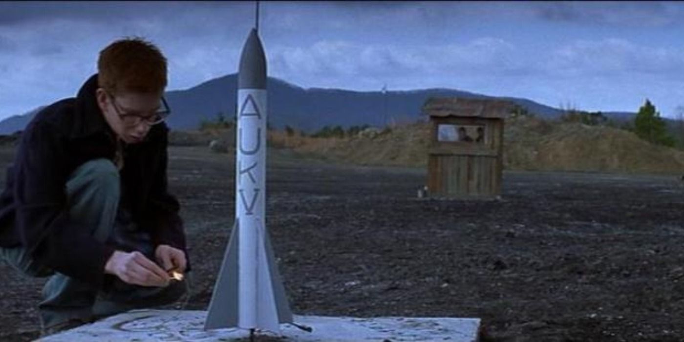 Chris Owen lights a rocket in October Sky.