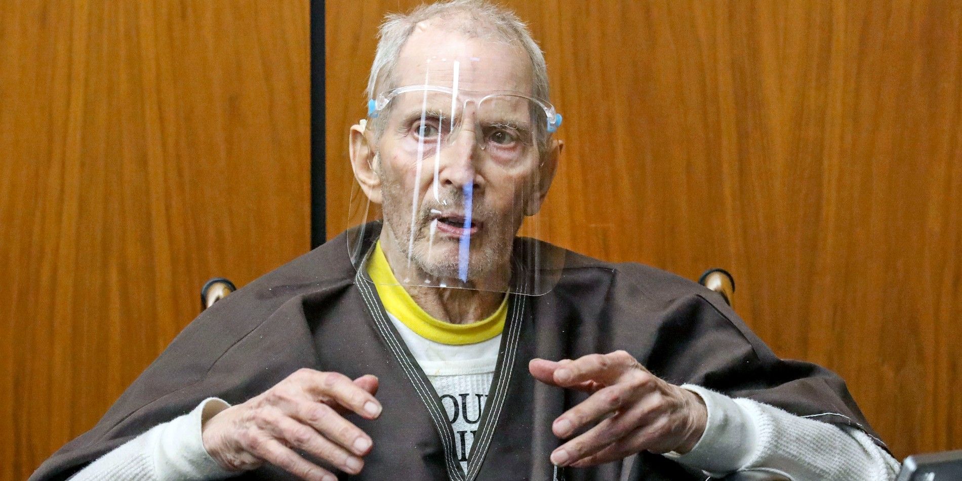 Robert Durst wearing a face shield and speaking in court