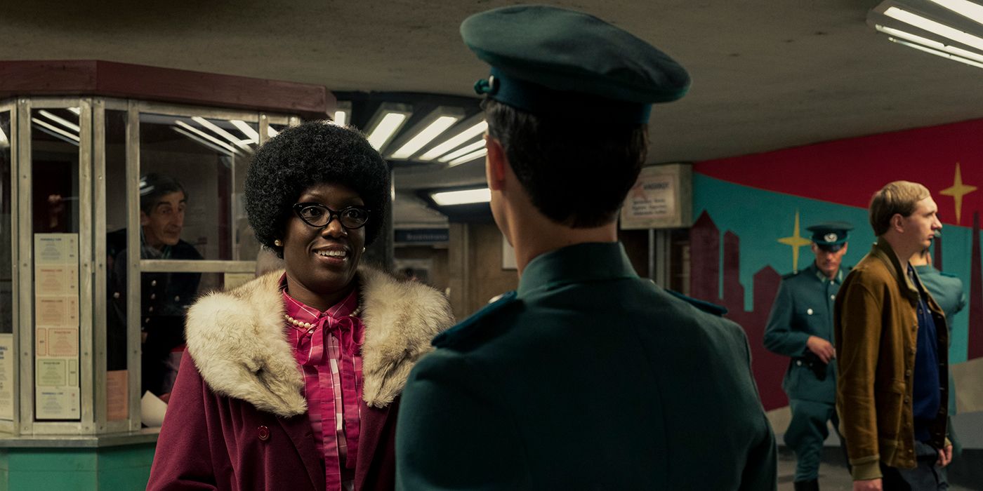 Young Agnes on Russian Doll talking to an officer in the train station.