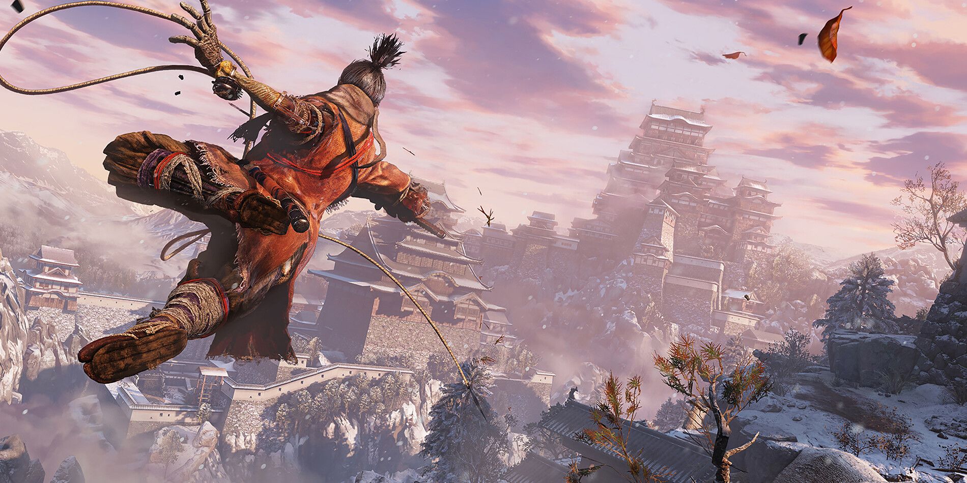 Wolf from Sekiro jumps across a frozen gap with a temple in the background