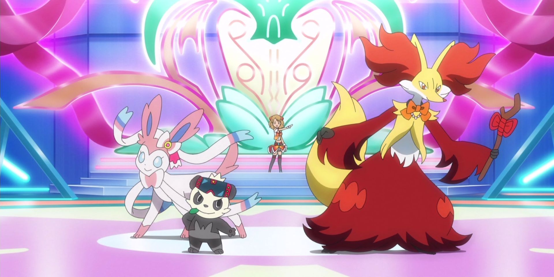Serena and her Delphox, Sylveon, and Pancham performing in Pokemon Master Journeys