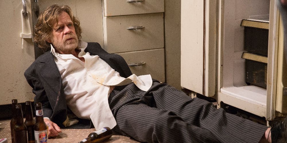 Frank lies beside beer bottles in Shameless