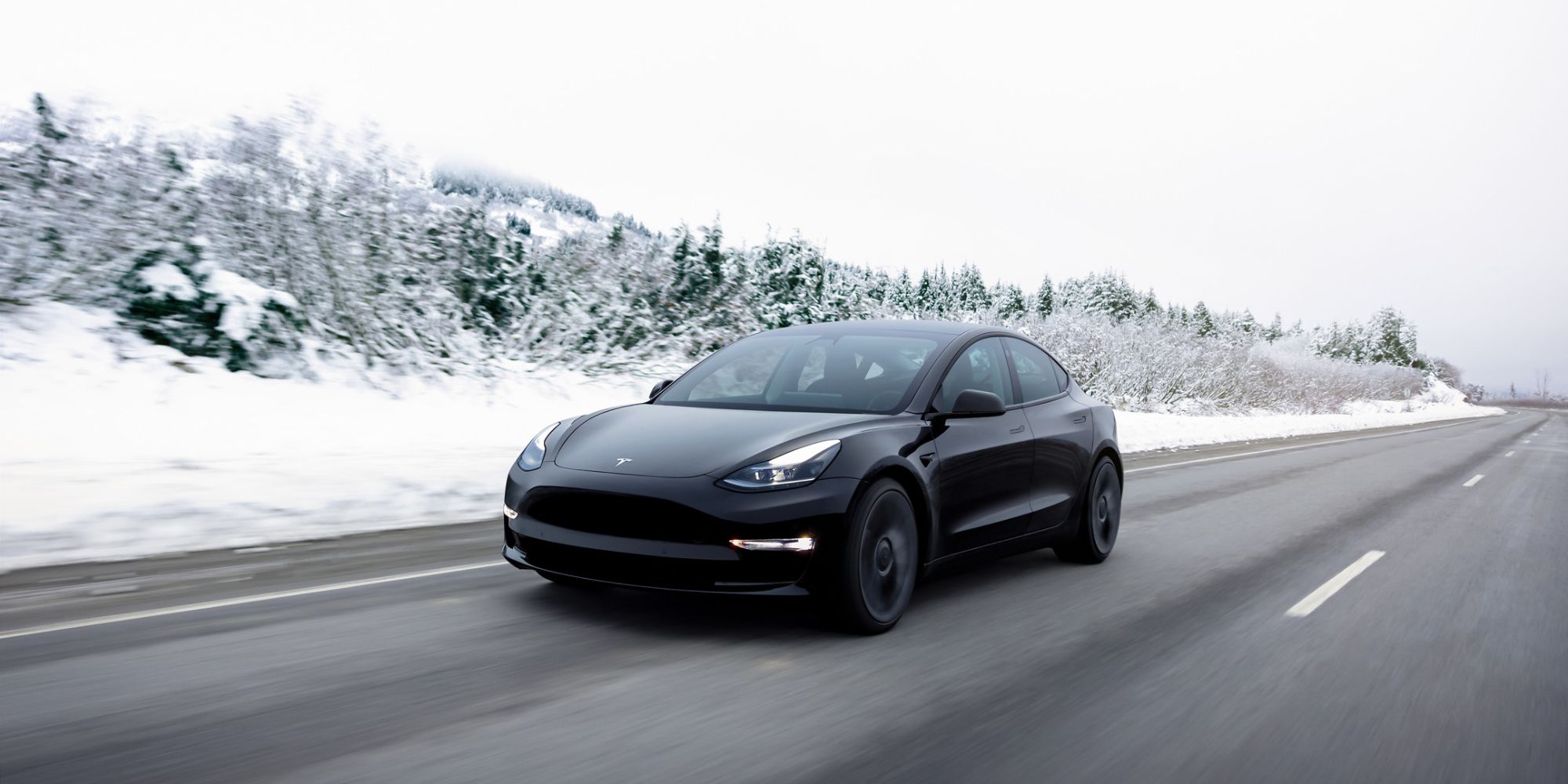 Tesla Model 3 driving in the winter