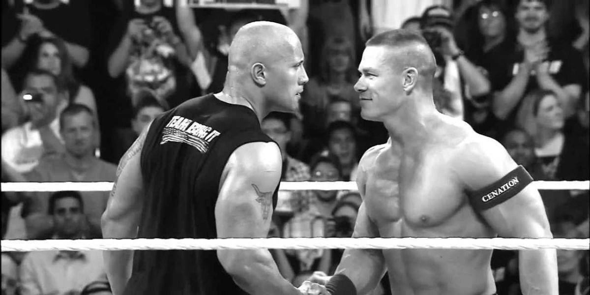 The Rock faces off against John Cena in the ring