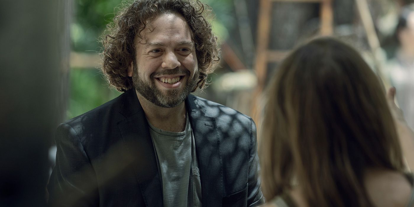 Luke smiling widely in a scene from The Walking Dead.