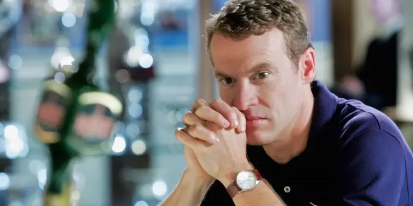 Tate Donovan as Jimmy Cooper looking contemplative on The OC