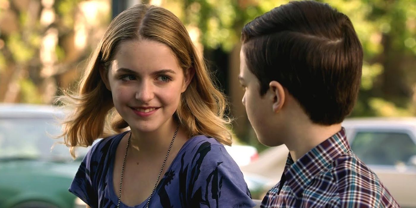 Mckenna Grace as Paige smiling at Sheldon (Iain Armitage) in Young Sheldon season 4, episode 16