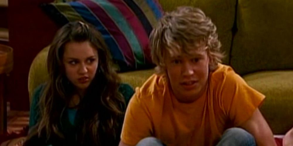 A disgusted Miley Cyrus looks at a scared Austin Butler as Derek in Hannah Montana