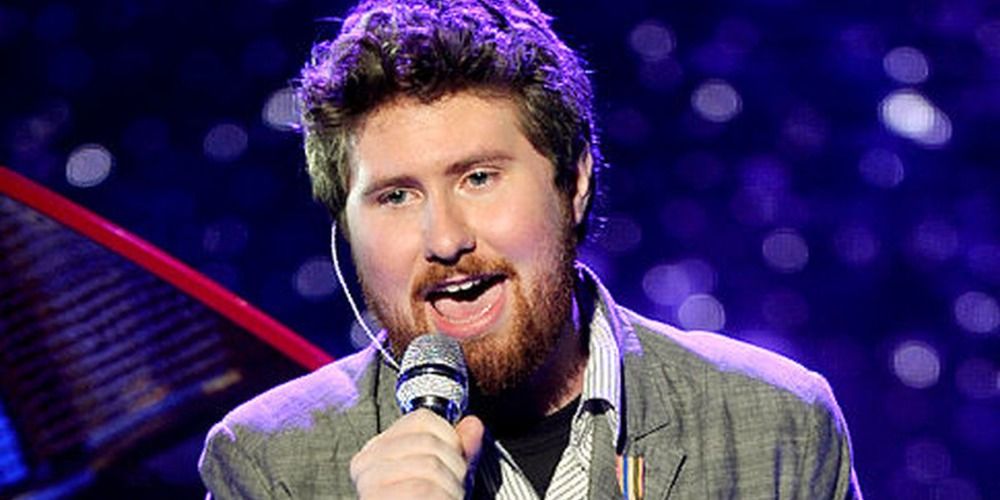 An image of Casey Abrams singing into a microphone in American Idol