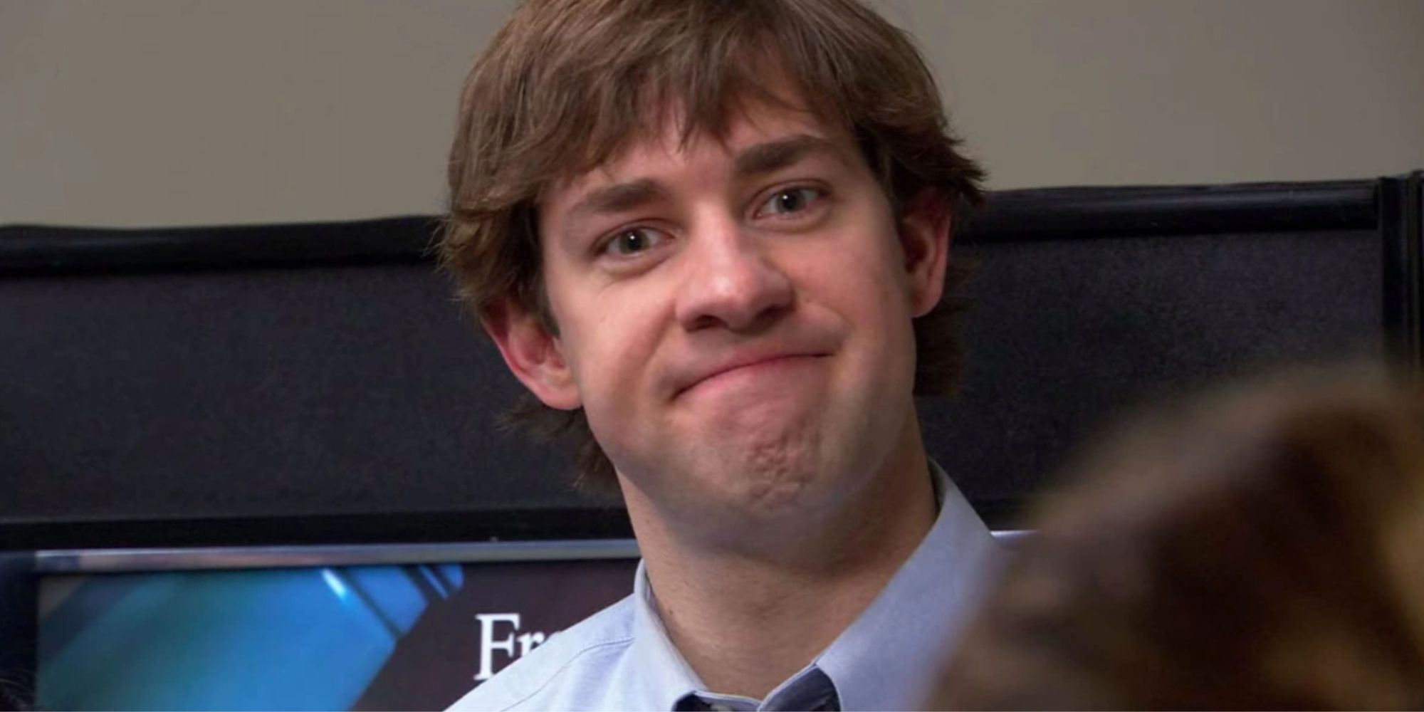 An image of Jim looking smug in The Office