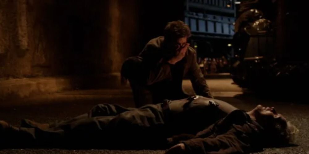 An image of Peter crying over Uncle Ben in Amazing Spider-Man