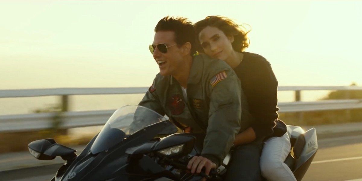 An image of Tom Cruise and Jennifer Connelly riding a motorcycle in Top Gun 2