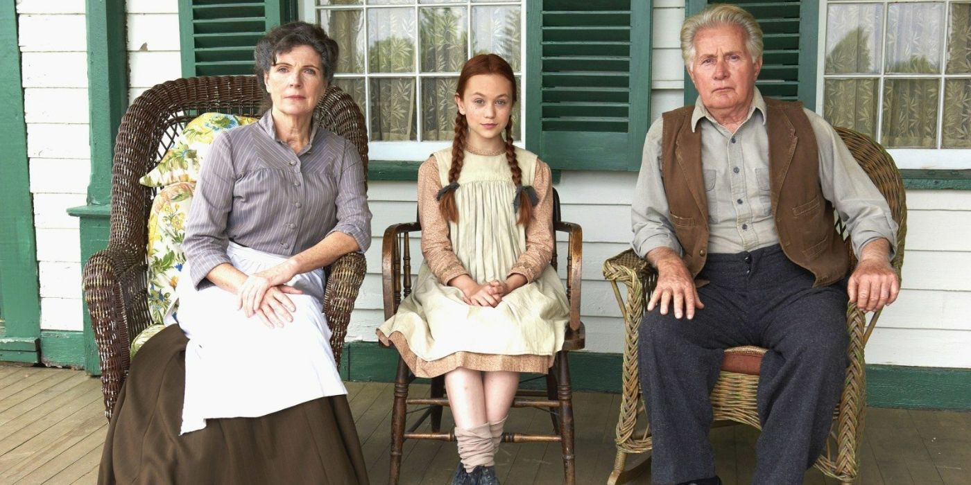 Anne, Matthew and Marilla sitting on a porch inthe 2016 Anne of Green Gables movie. 