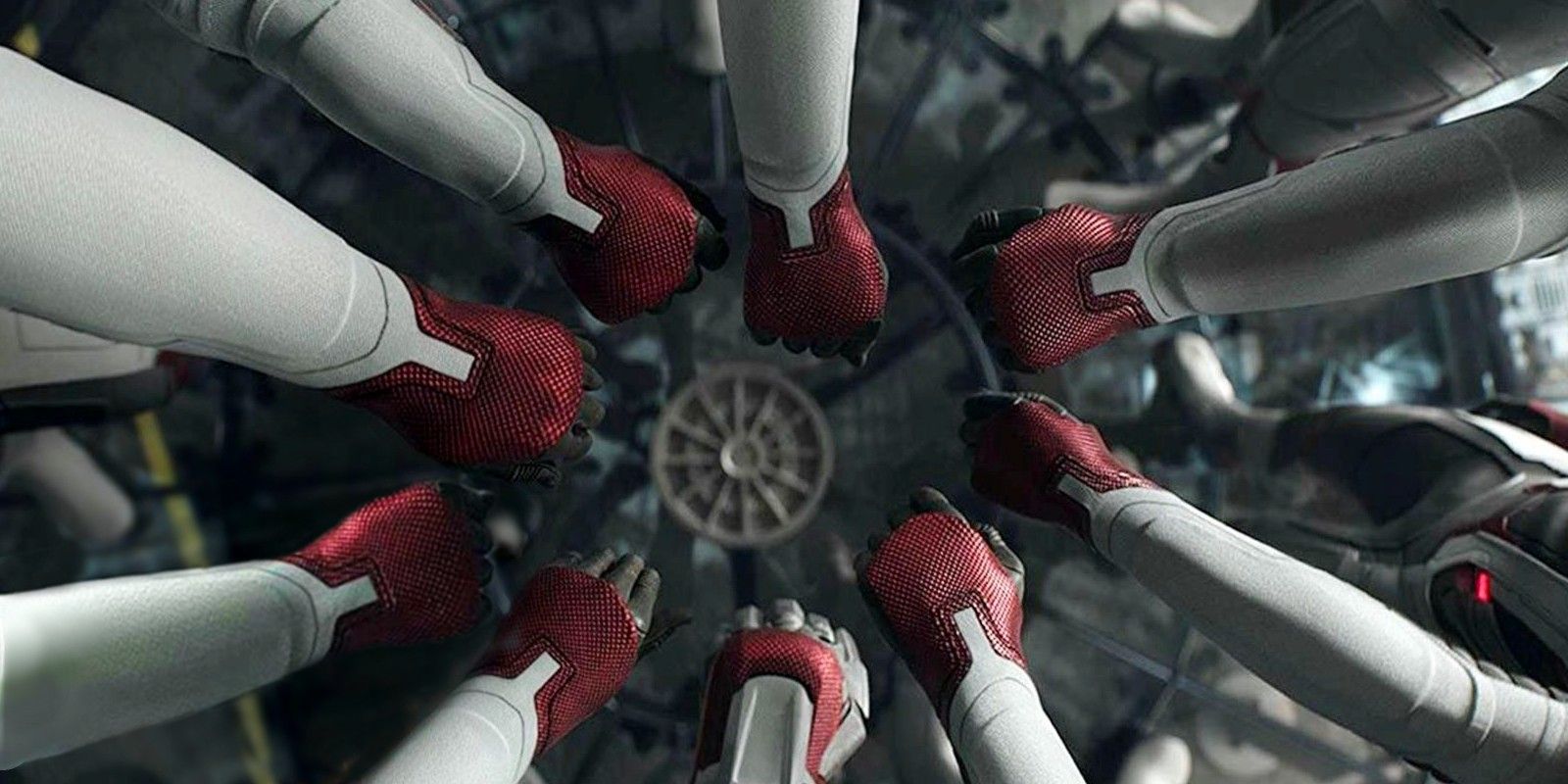 The Avengers put their hands together before time traveling