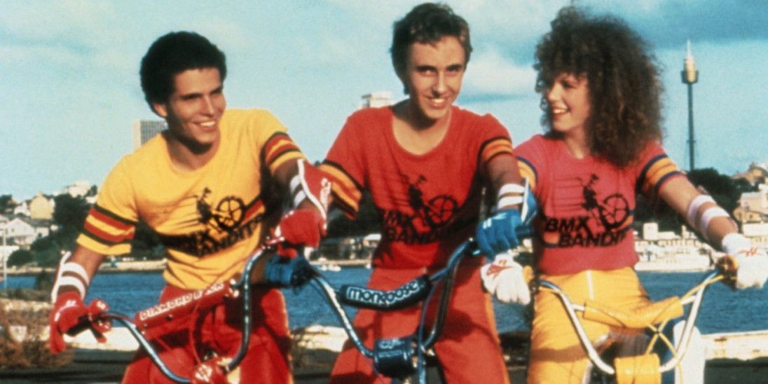 Three characters riding bikes in 1983's BMX Bandits.
