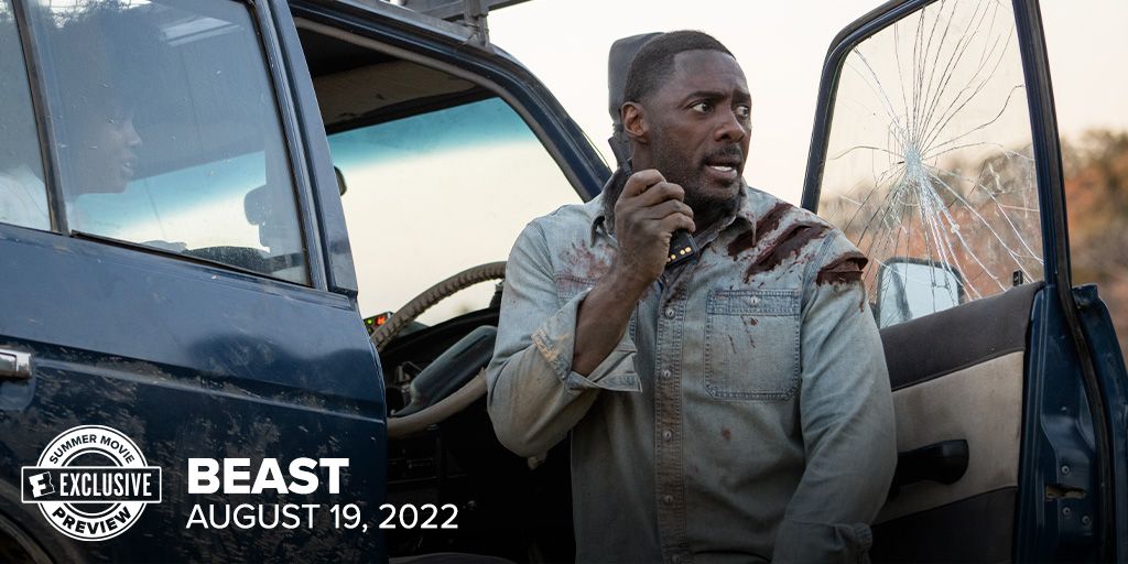 Idris Elba uses walkie talkie in Beast